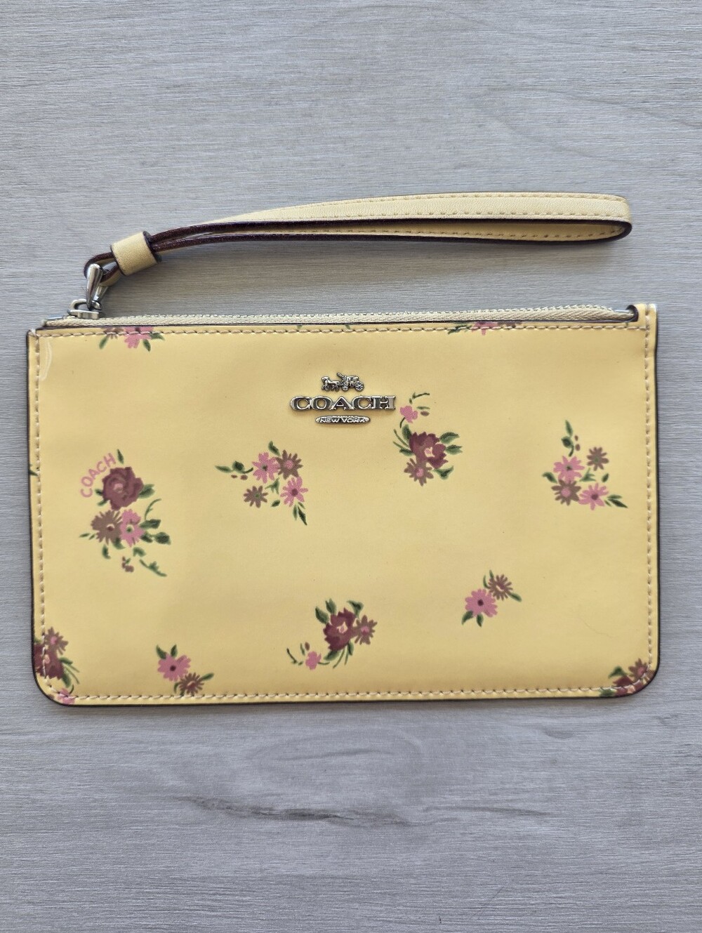 COACH Butter up Floral Wristlet